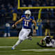 SDSU's quarterback Mark Gronowski (11) runs with the ball on Friday, Dec. 15, 2023 at Dana J. Dykhouse in Brookings.